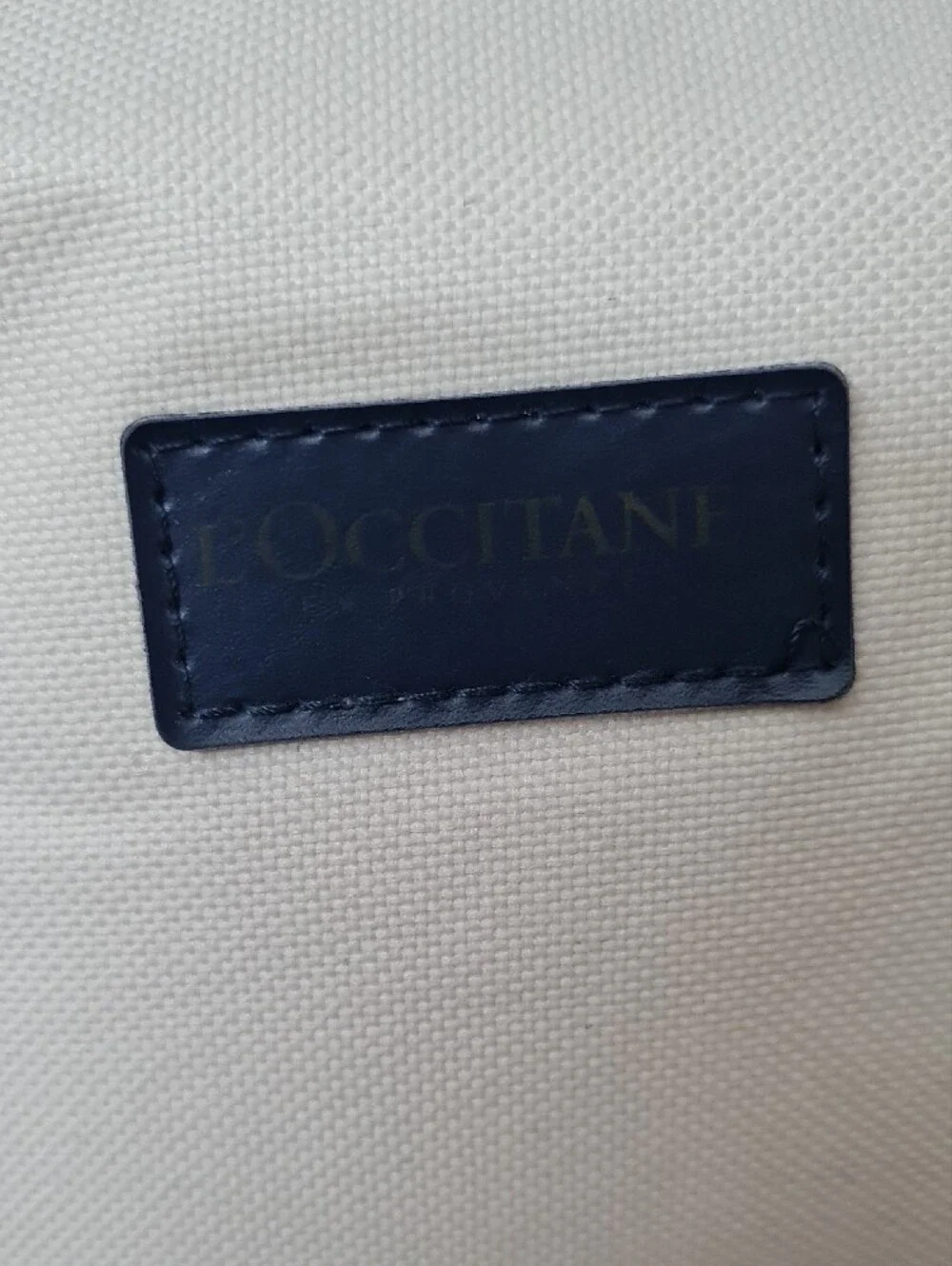L'OCCITANE Cream and Black Canvas Toiletry Case